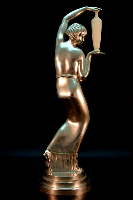 Art Deco-bronze-female Art Deco bronze female posing with pottery vessel