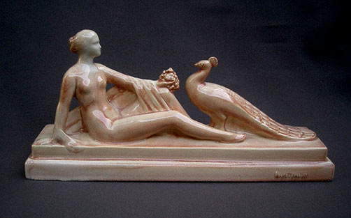 Beautiful-ceramic-statue-time-art-deco,-woman-paon-signed-lemone woman and peacock porcelain figurine