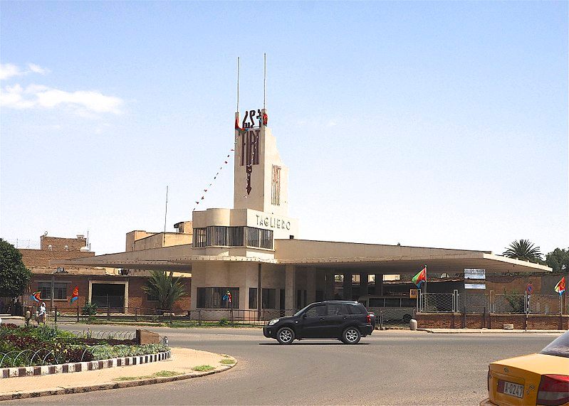 8c970eaa-61b3-4192-9f81-0198d3c0e9055e6ef098d61f6984cb_800px-Asmara_Eritrea_Fiat_Tagliero_Building_(30476150040)